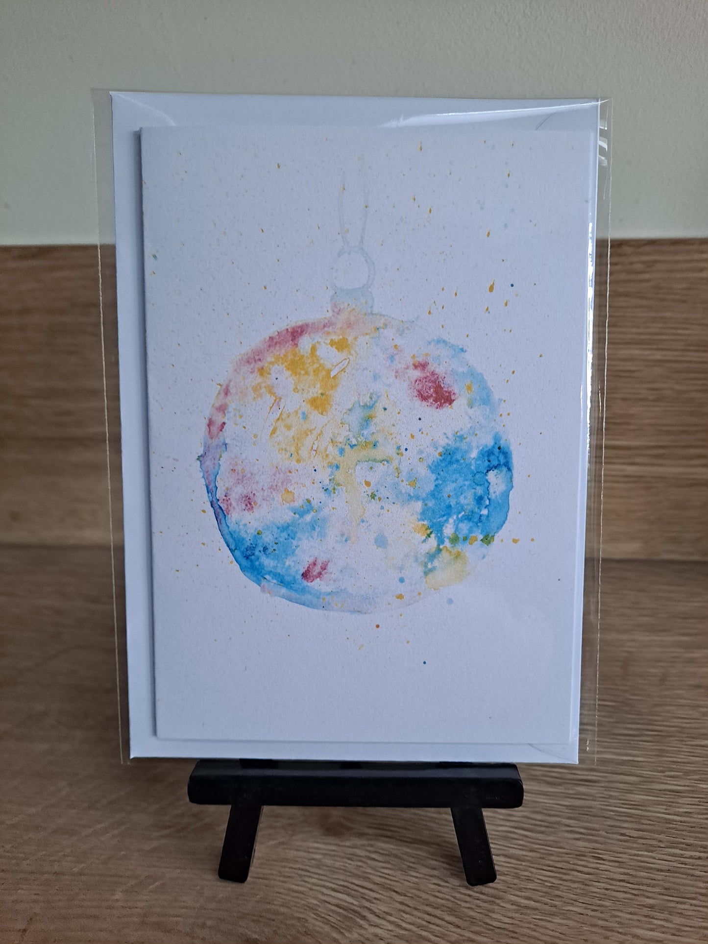 Bauble 2 - Greetings Card by Hannah Hildebrand