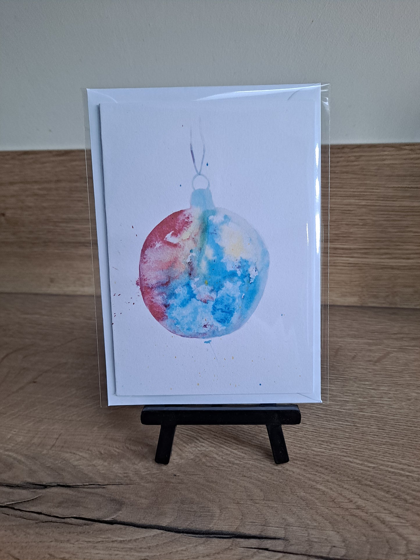 Bauble 1 - Greetings Card by Hannah Hildebrand